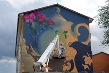 Natalia's husband makes corrections in the rough paintings